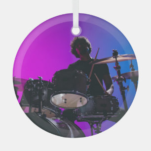 Drummer silhouette, neon blue-pink background. glass ornament