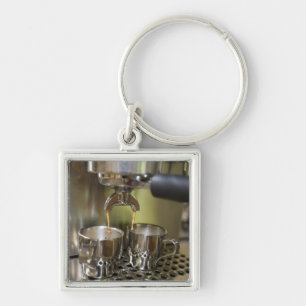 Dual espresso shots being brewed. keychain