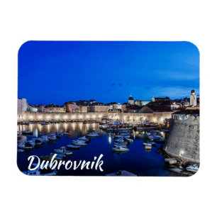 Dubrovnik harbor and walls illuminated at night magnet