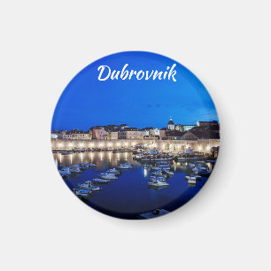Dubrovnik harbor and walls illuminated at night magnet