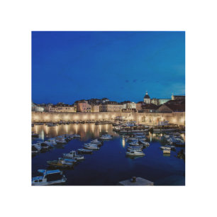Dubrovnik harbor and walls illuminated at night wood wall art