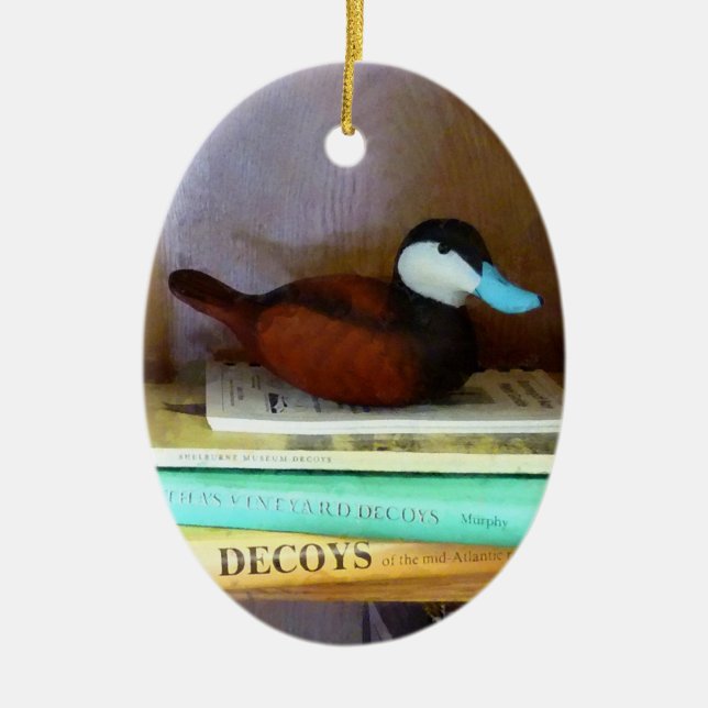 Duck Decoy On Bookshelf Ceramic Ornament (Front)