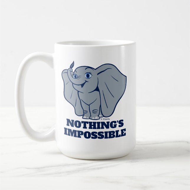 Dumbo | Cartoon Dumbo Holding Up Feather Coffee Mug (Left)