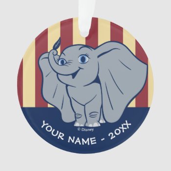 Dumbo | Cartoon Dumbo Holding Up Feather Ornament by dumbo at Zazzle