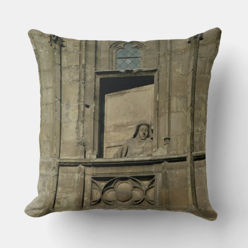 Dummy window in the entrance facade with a figure throw pillow