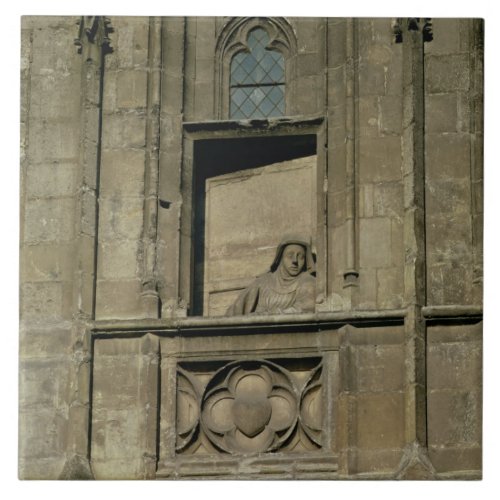 Dummy window in the entrance facade with a figure tile