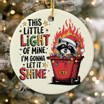 Dumpster Fire Raccoon Monogram Christmas Ceramic Ornament<br><div class="desc">Add some light-hearted chaos to your holiday decor with this quirky Christmas ornament, featuring a mischievous raccoon in a flaming dumpster with the phrase "This Little Light of Mine, I'm Gonna Let It Shine." Perfect for adding a dash of humor to the season, this ornament includes space for a monogram,...</div>
