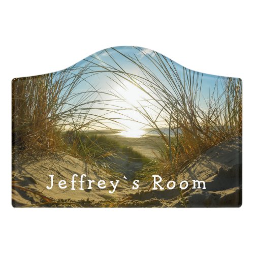 dunes and sea and name door sign
