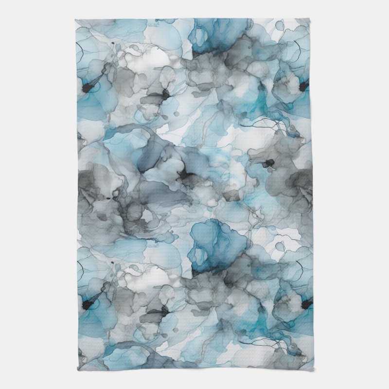 Abstract liquid ink swirls in blue and grey tones