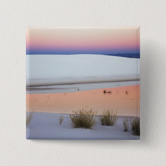 Dusk sky reflected in pool of water from pinback button (Front)