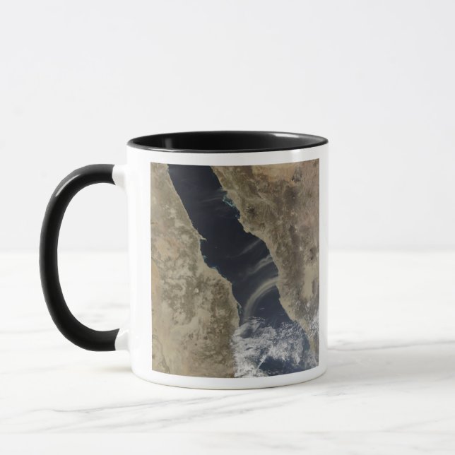 Dust plumes blow off the coast of Saudi Arabia Mug (Left)