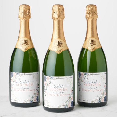 Dusty Blue Blush Pink Gold Floral Bridal Shower Champagne Label - A unique bridal shower champagne label, this trendy design features a floral bouquets of soft, watercolor roses in shades of trendy dusty blue and blush pink, accented with gold, and bordered in dusty blue. Part of a coordinated suite. See full collection here: https://www.zazzle.com/collections/light_dusty_blue_blush_pink_gold_bridal_shower-119382468673252777 Contact designer for additional products. Copyright Elegant Invites, all rights reserved.