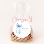 Dusty Blue Bow She's Tying the Knot Bridal Shower Favor Tags<br><div class="desc">Welcome your guests in style with our **Blue She's Tying The Knot Bridal Shower Welcome Foam Board**. Featuring a romantic and whimsical design, this foam board is adorned with a soft blue bow, adding a touch of elegance to your bridal shower decor. The charming bow and delicate script set a...</div>