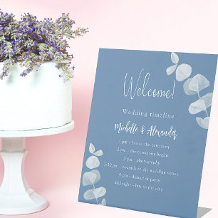 Dusty blue eucalyptus wedding program timeline pedestal sign