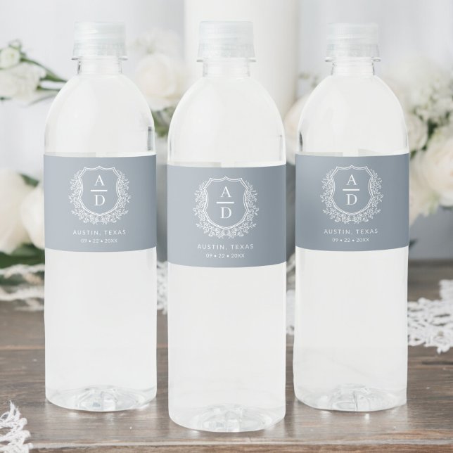 Dusty Blue Monogram Wedding Floral Crest Water Bottle Label (Creator Uploaded)