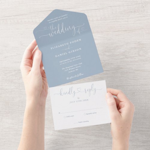 Dusty Blue Script Hearts Minimalist Wedding All In All In One Invitation - All in one wedding invitation featuring elegant hearts script typography and monogram initials on a dusty blue background. The invitation includes a perforated RSVP card that’s can be individually addressed or left blank for you to handwrite your guest's address details. Designed by Thisisnotme©