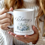 Dusty Blue White Floral Wedding Favor Coffee Mug<br><div class="desc">Elegant Wedding mugs perfect for the bride and groom to share with their wedding guests. Each mug features "The Wedding of" in an elegant script font, with the names of the bride and groom elegantly displayed at the bottom. Adorned with beautiful dusty blue and white watercolor flowers, these glasses are...</div>