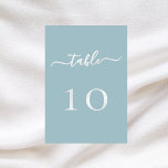 Dusty blue white script wedding table number card<br><div class="desc">A dusty blue background decorated.  White text.
  

Personalize and add your table numbers.  Add your numbers one by one.</div>