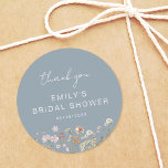 Dusty Blue Wildflower Thank You Bridal Shower Classic Round Sticker<br><div class="desc">Express gratitude with our Wildflower Thank You Bridal Shower In Bloom Classic Round Sticker. These charming stickers feature a delightful wildflower design, infusing a touch of natural beauty into your bridal shower thank-you notes or favors. The classic round shape adds versatility, making them perfect for various uses, from sealing envelopes...</div>