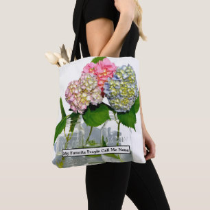 Dusty pink blue yellow green floral hydrangeas tote bag