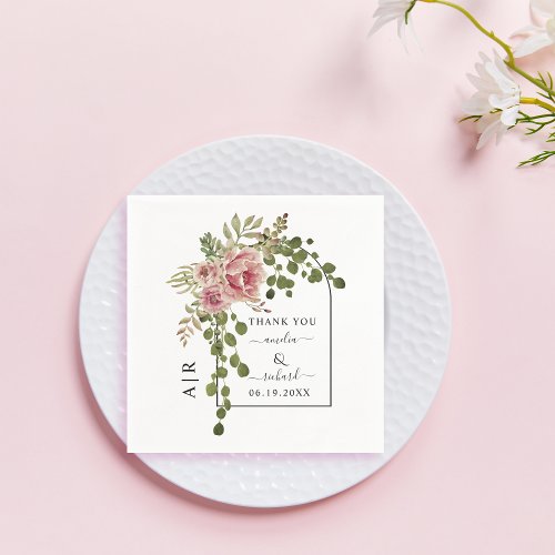 Dusty rose pink flowers arch and monogram wedding napkins