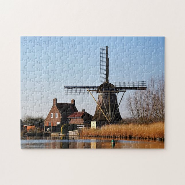 Dutch mill by the water's edge. jigsaw puzzle (Horizontal)