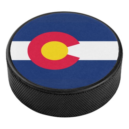 Dynamic Colorado State Flag Graphic on a Hockey Puck