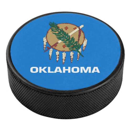 Dynamic Oklahoma State Flag Graphic on a Hockey Puck