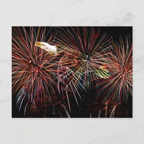 Eagle flying through fireworks postcard