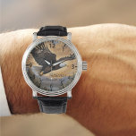 Eagle Soaring Watch<br><div class="desc">Embrace the Majesty of Time with our Eagle Soaring Watch. This exquisite timepiece captures the essence of freedom and honor, featuring a majestic eagle in flight against a backdrop of golden skies. It’s a symbol of strength and grace, a perfect tribute to the unyielding spirit of fatherhood. With the date...</div>