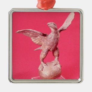 Eagle with spread wings on a ball metal ornament