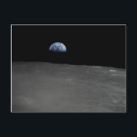 Earth Rise Postcard<br><div class="desc">The Apollo 16 crew captured this Earthrise with a handheld Hasselblad camera during the second revolution of the moon. Identifiable craters seen on the moon include Saha, Wyld and Saenger. Much of the terrain seen here is never visible from the Earth, as the command module was passing onto what is...</div>