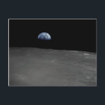 Earth Rise Postcard<br><div class="desc">The Apollo 16 crew captured this Earthrise with a handheld Hasselblad camera during the second revolution of the moon. Identifiable craters seen on the moon include Saha, Wyld and Saenger. Much of the terrain seen here is never visible from the Earth, as the command module was passing onto what is...</div>