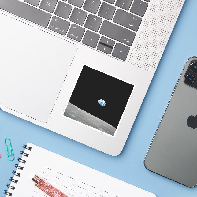 Earth Rising Above The Lunar Horizon. Sticker (Laptop w/ iPhone)