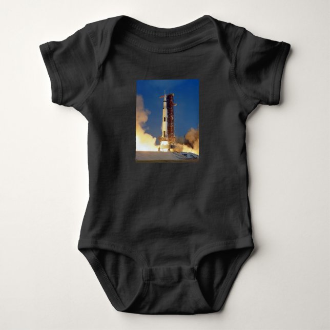 Earth Shakes as Saturn V Blazes Skyward to Moon Baby Bodysuit (Front)