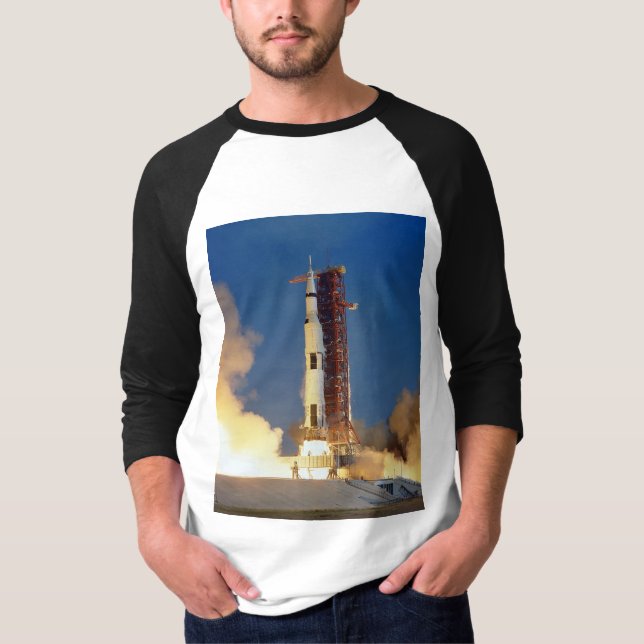 Earth Shakes as Saturn V Blazes Skyward to Moon T-Shirt (Front)