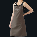 Earth tone brown Chic Elegant script Name Apron<br><div class="desc">She'll love a personalized apron as she bakes those goodies,  cooks delicious dishes or work with her plants. A perfect gift to encourage her talents. White script for the name with long-tail embellishments on earth-tone brown.</div>