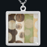 Earth Tone Wood Panel Painting with Circles Silver Plated Necklace<br><div class="desc">Created by Norman Wyatt, Jr., this painting was made utilizing the French process known as Giclee to spray ink droplets onto a canvas. Get lost in the concentric circles, the melding of earth tone colors across the painting, or the wood panel look of the piece. A great purchase for anyone...</div>