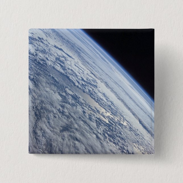 Earth's horizon against the blackness of space button (Front)