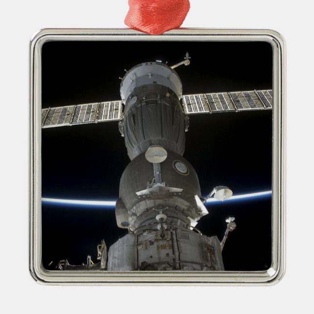 Earth's limb intersects a Soyuz spacecraft Metal Ornament (Front)