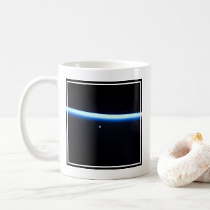 Earth's Thin Line Of Atmosphere And A Gibbous Moon Coffee Mug