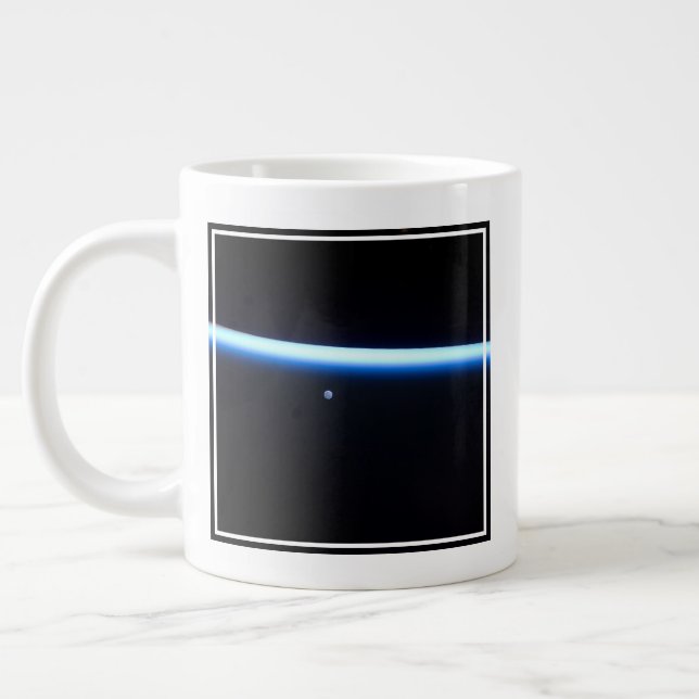 Earth's Thin Line Of Atmosphere And A Gibbous Moon Giant Coffee Mug (Left)