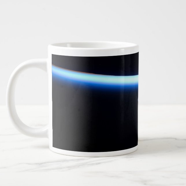 Earth's Thin Line Of Atmosphere And A Gibbous Moon Giant Coffee Mug (Left)