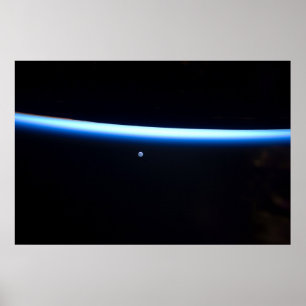 Earth's Thin Line Of Atmosphere And A Gibbous Moon Poster