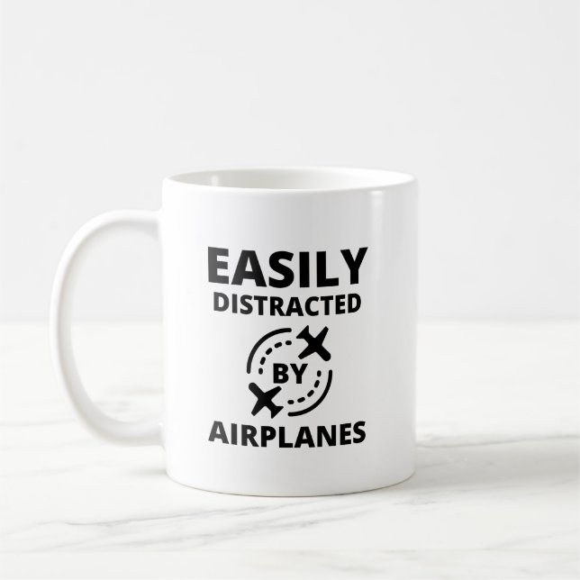 Easily distracted by planes funny pilot aviator coffee mug (Left)