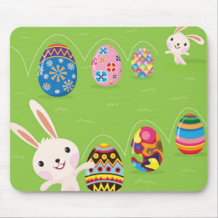 Easter bunny playful with painted eggs mouse pad