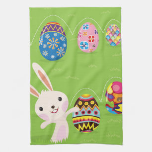 Easter bunny playful with painted eggs towel