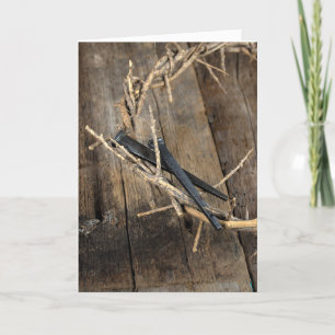 Easter crown of thorns and nails on wood holiday card