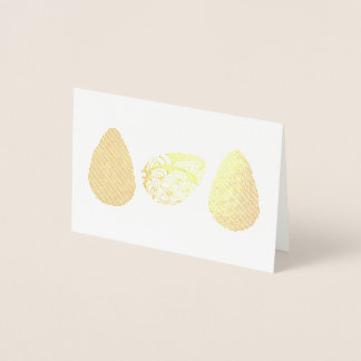 Easter eggs lined up with different colors and pat foil card