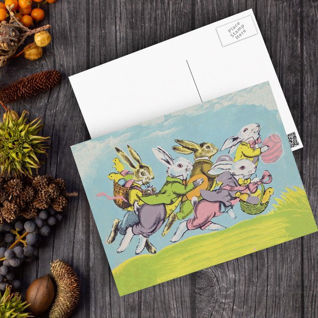 Easter Running Pastel Rabbits Holiday Postcard (Group White Easter Rabbits in grass Blue sky Baskets Eggs on Easter holiday postcard.)
